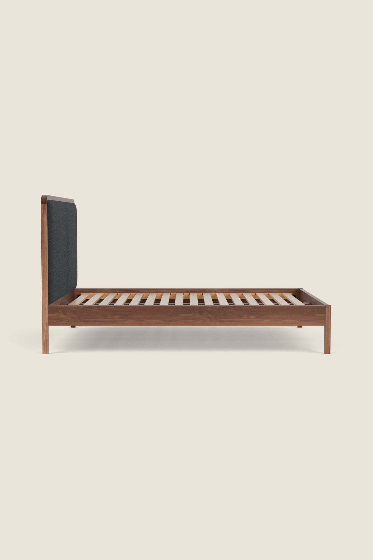 Dune Upholstered Bed built from walnut wood from Justines Home in Florida