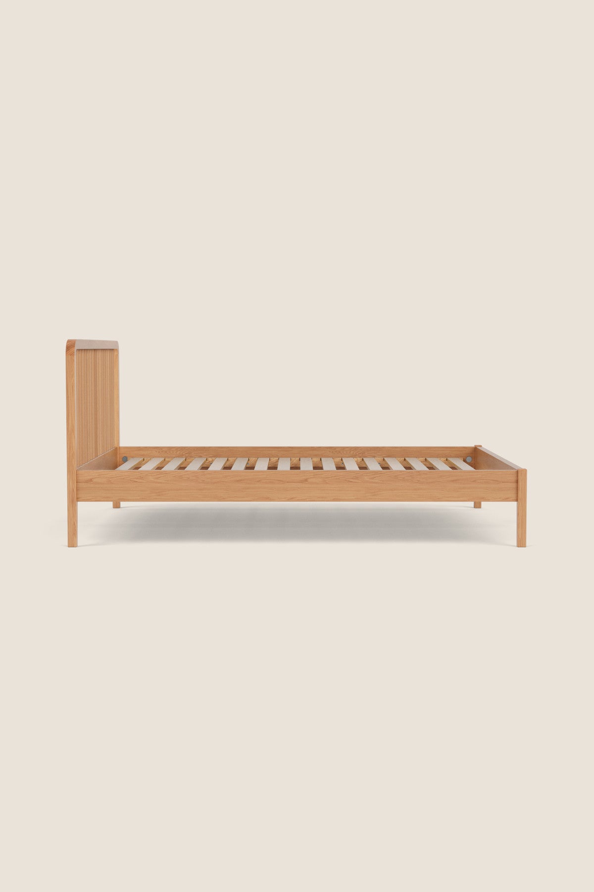 Modern Spindle bed in white oak wood from Mazhil & Co. Co.