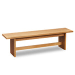 Bench with panel style trestle legs built in white oak wood. 