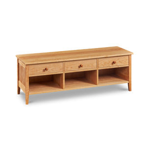 Shaker style storage bench with three drawers and cubby spaces in cherry wood