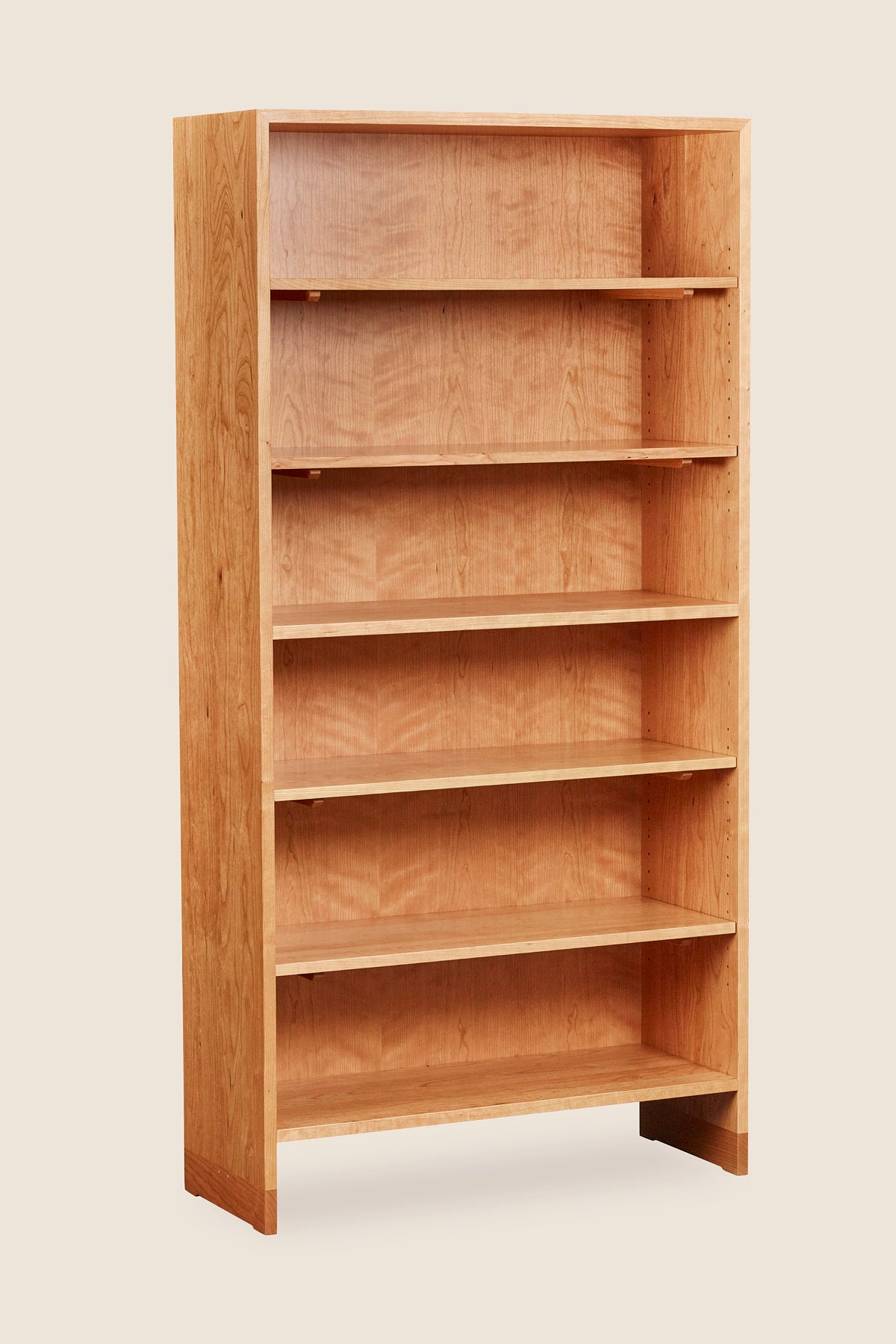 Lubec Tall Shelf in cherry with breadboard leg base