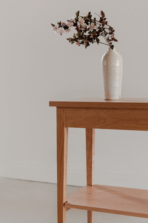 Shaker Heirloom Console Table with white vase and pink florals