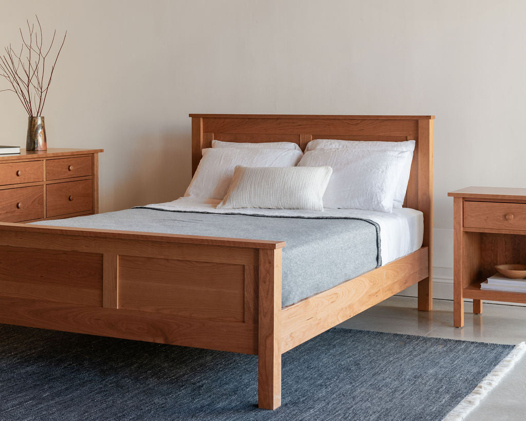 Bethel Shaker Bedroom set in cherry wood with modern styling and blue rug