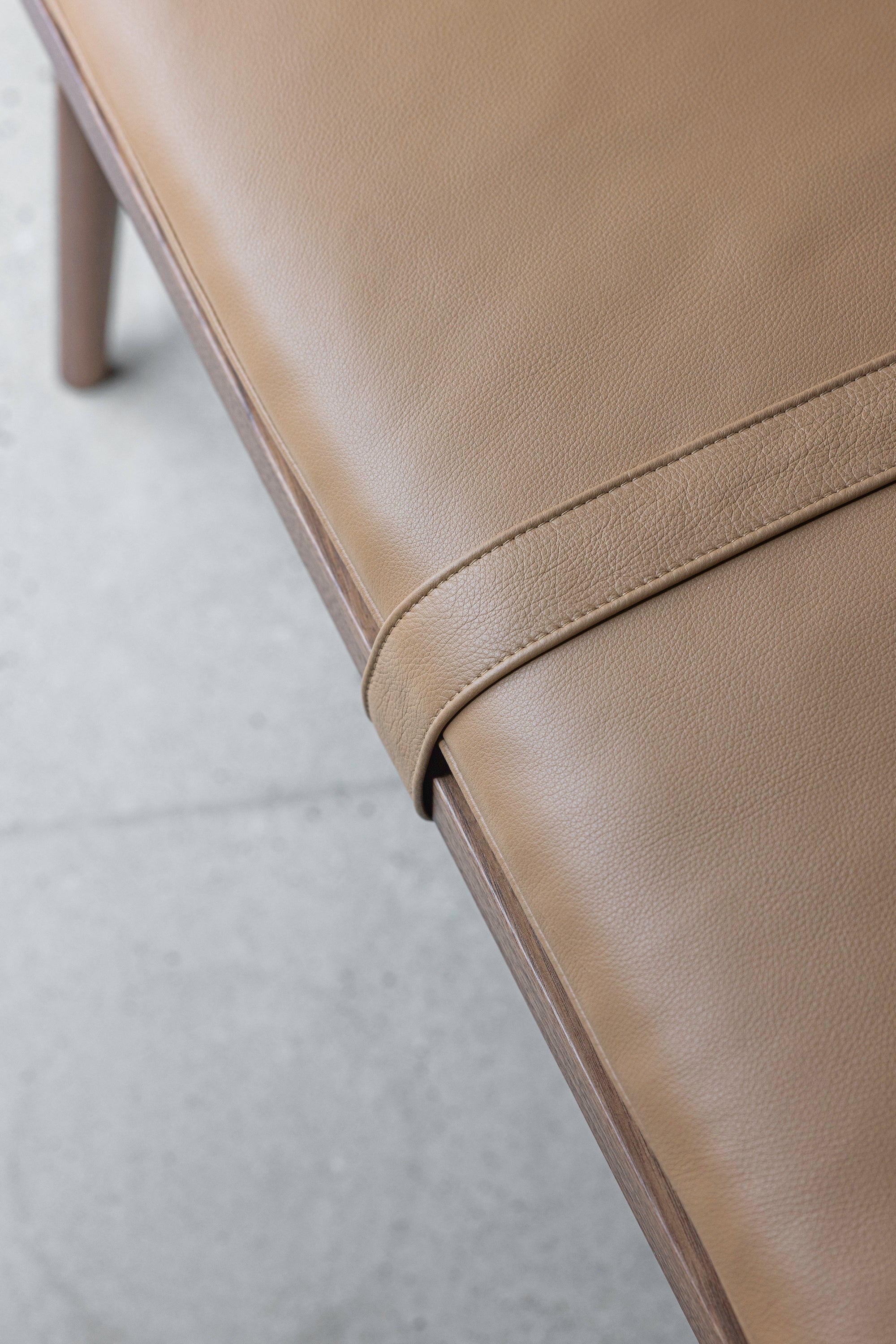 Details of the leather texture, color and stitching on the Hudson Bench from Mazhil & Co. of Arkansas
