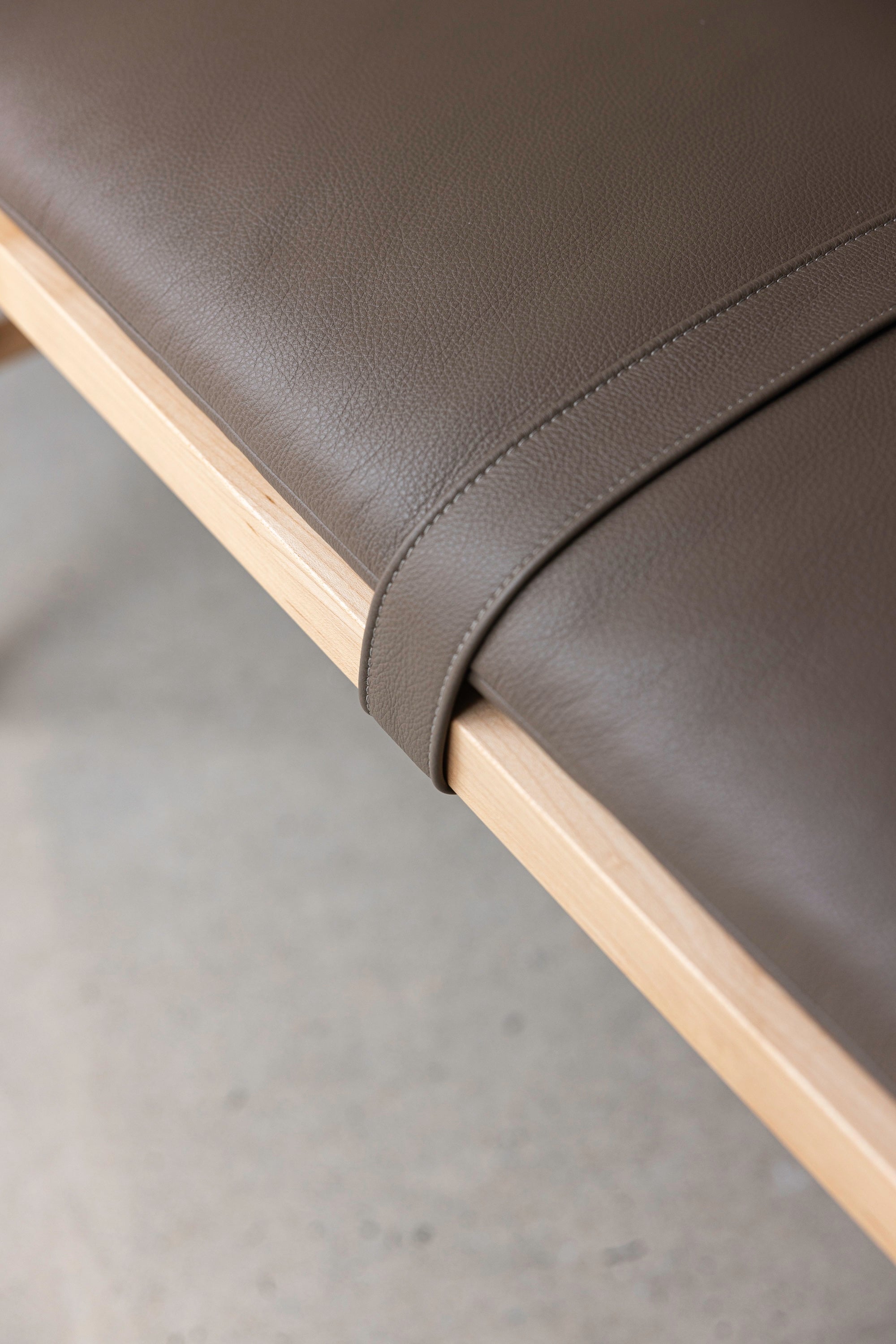 Details of the leather texture, color and stitching on the Hudson Bench from Mazhil & Co. of Arkansas
