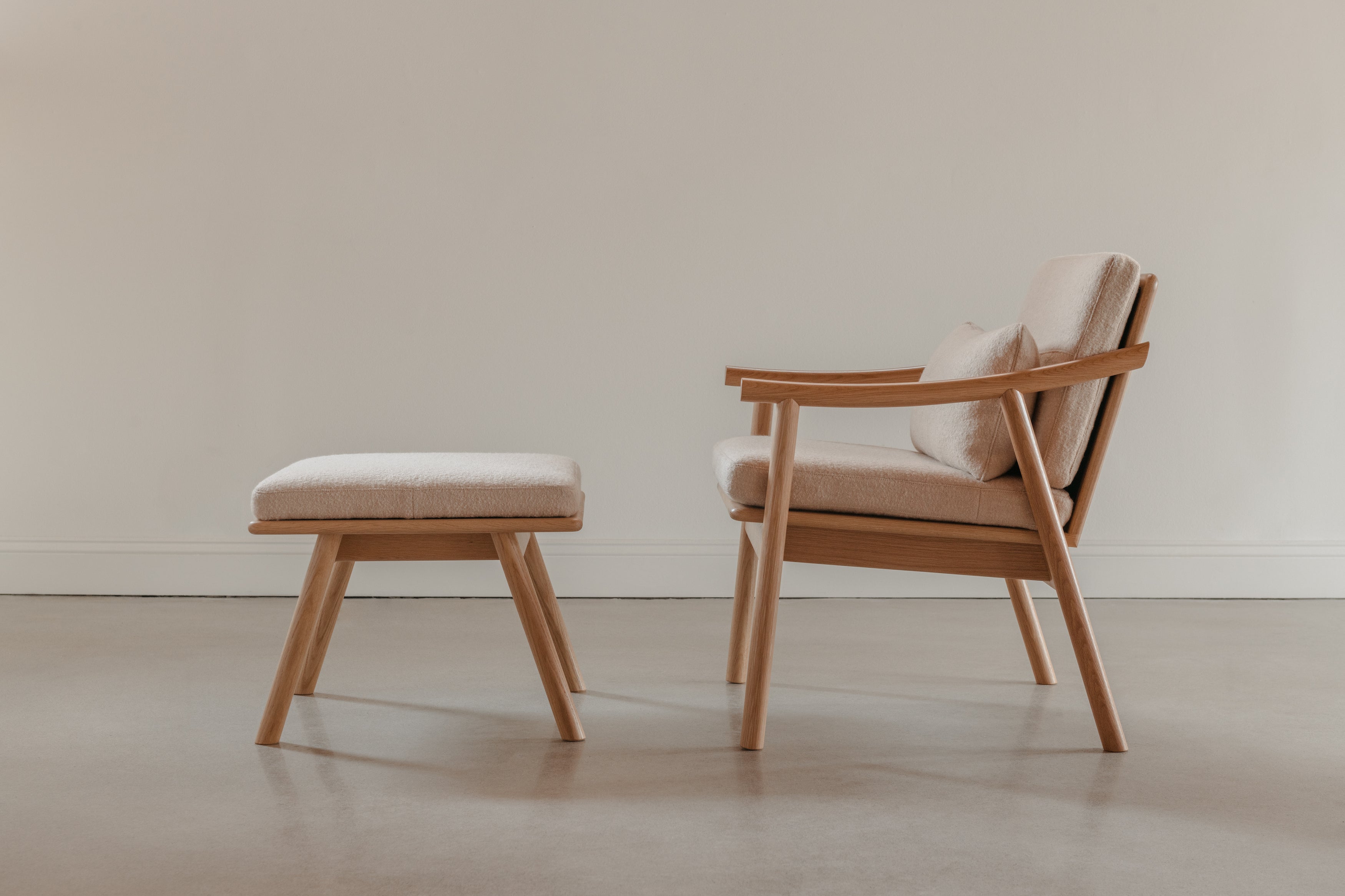 Solid white oak Scandinavian style Nautilus lounge chair and ottoman, from Maine's Chilton Furniture Co.