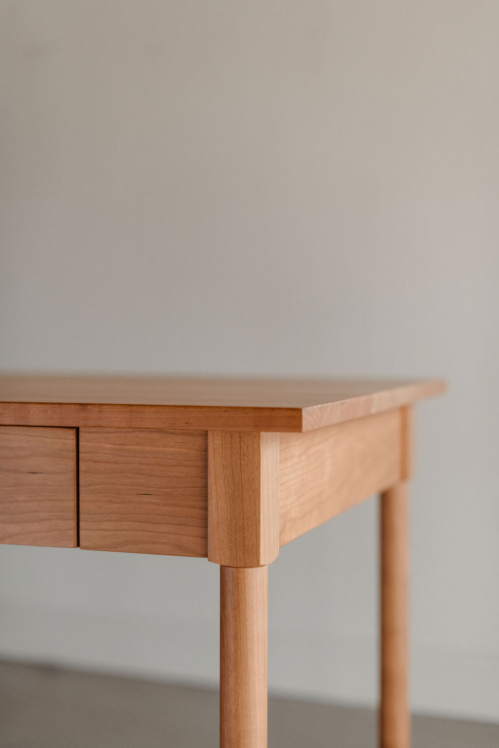 Round leg details on the MS1 Writing Desk from Mazhil & Co. of Arkansas