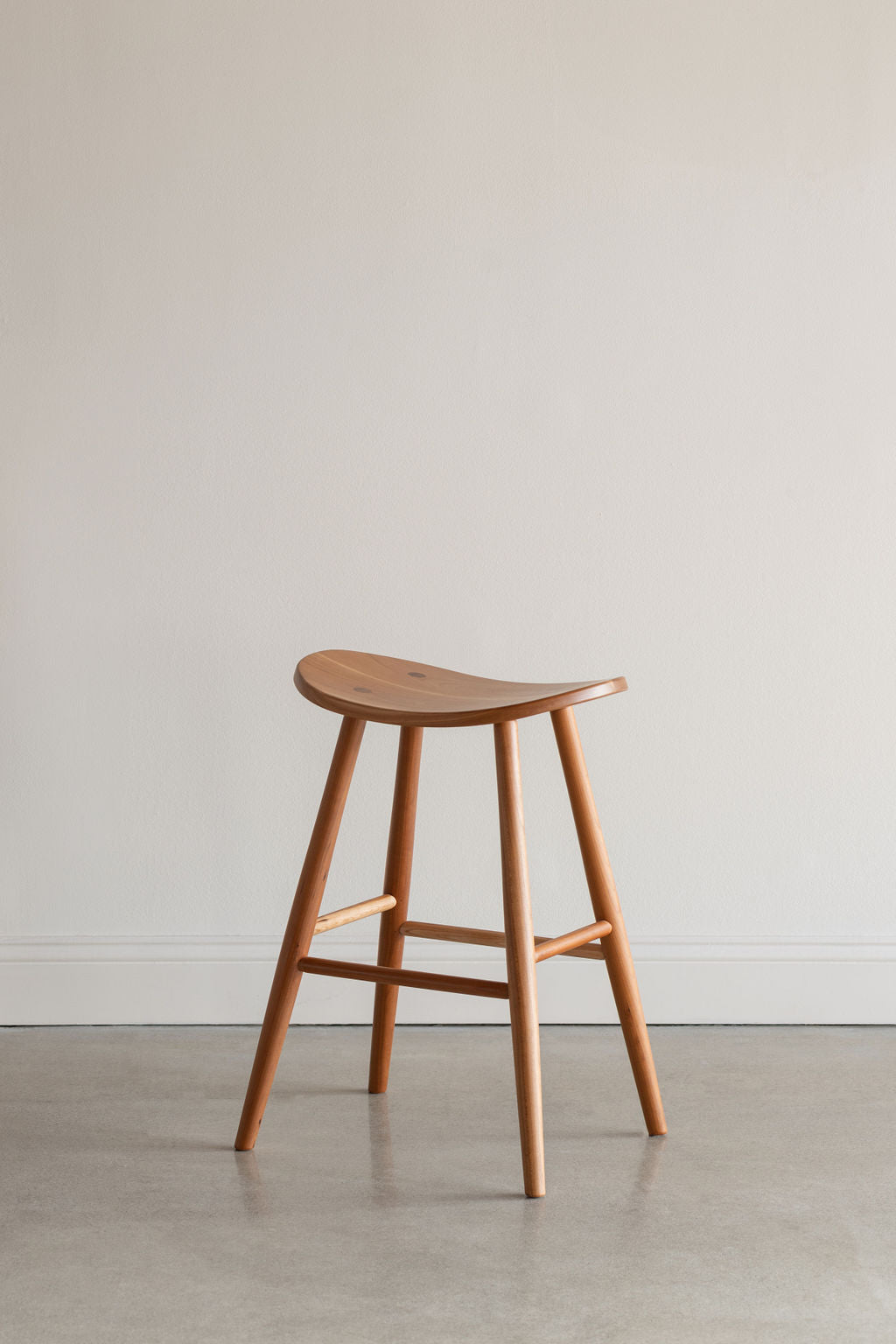 Cherry Davis Stool, a scooped saddle seat from Mazhil & Co. in Arkansas