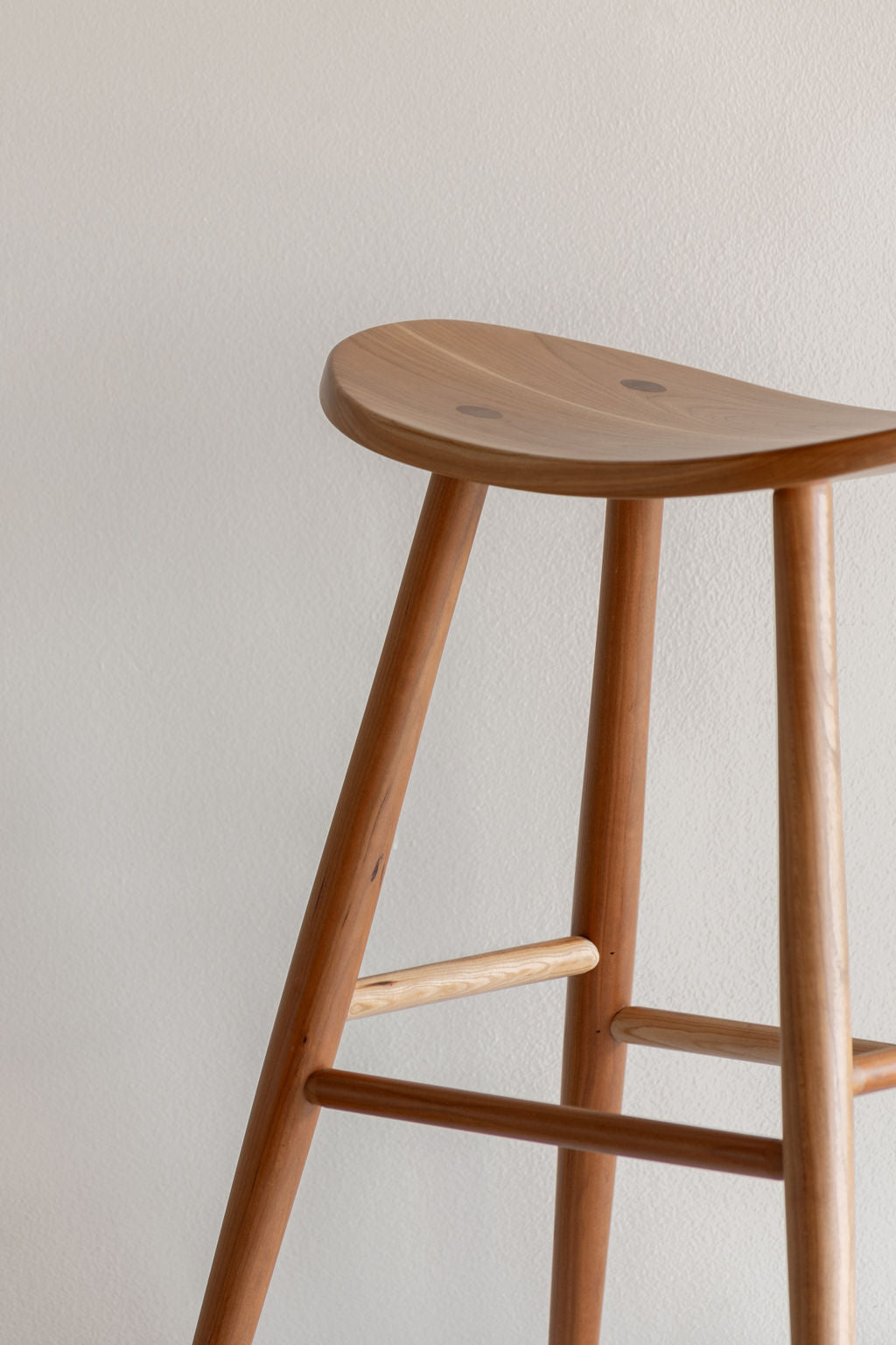 Cherry Davis Stool, a scooped saddle seat from Mazhil & Co. in Arkansas