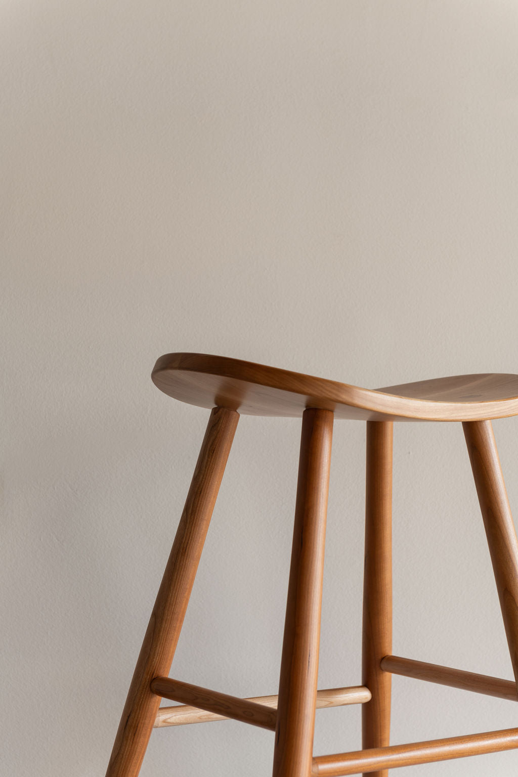 Cherry Davis Stool, a scooped saddle seat from Mazhil & Co. in Arkansas