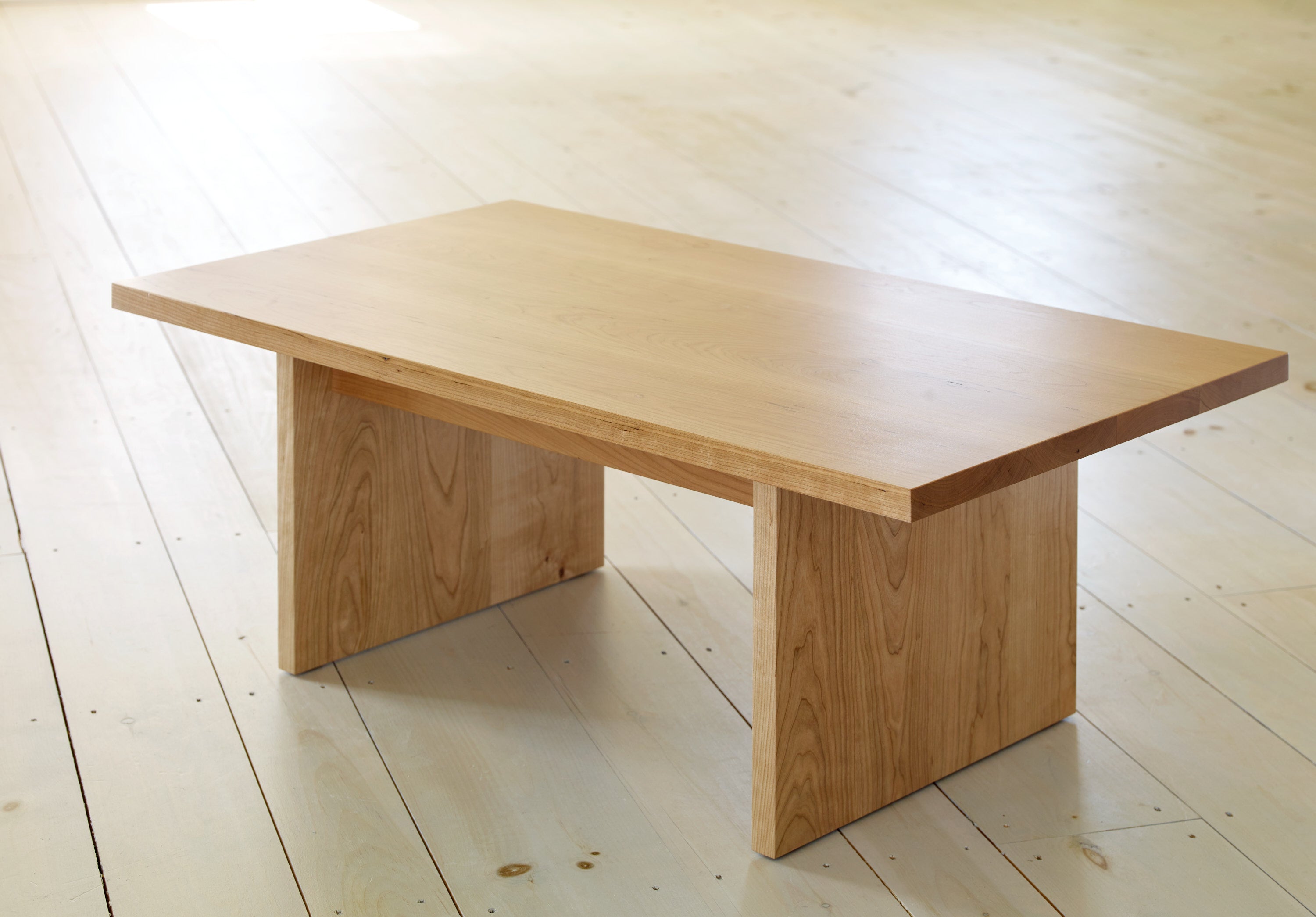 Cherry wood Hygge Coffee Table on wood pine floors in bright room