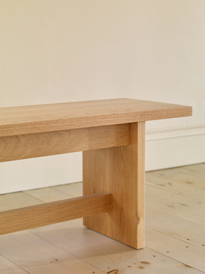 Details of the Hygge Bench in white oak showing thickness of top and legs