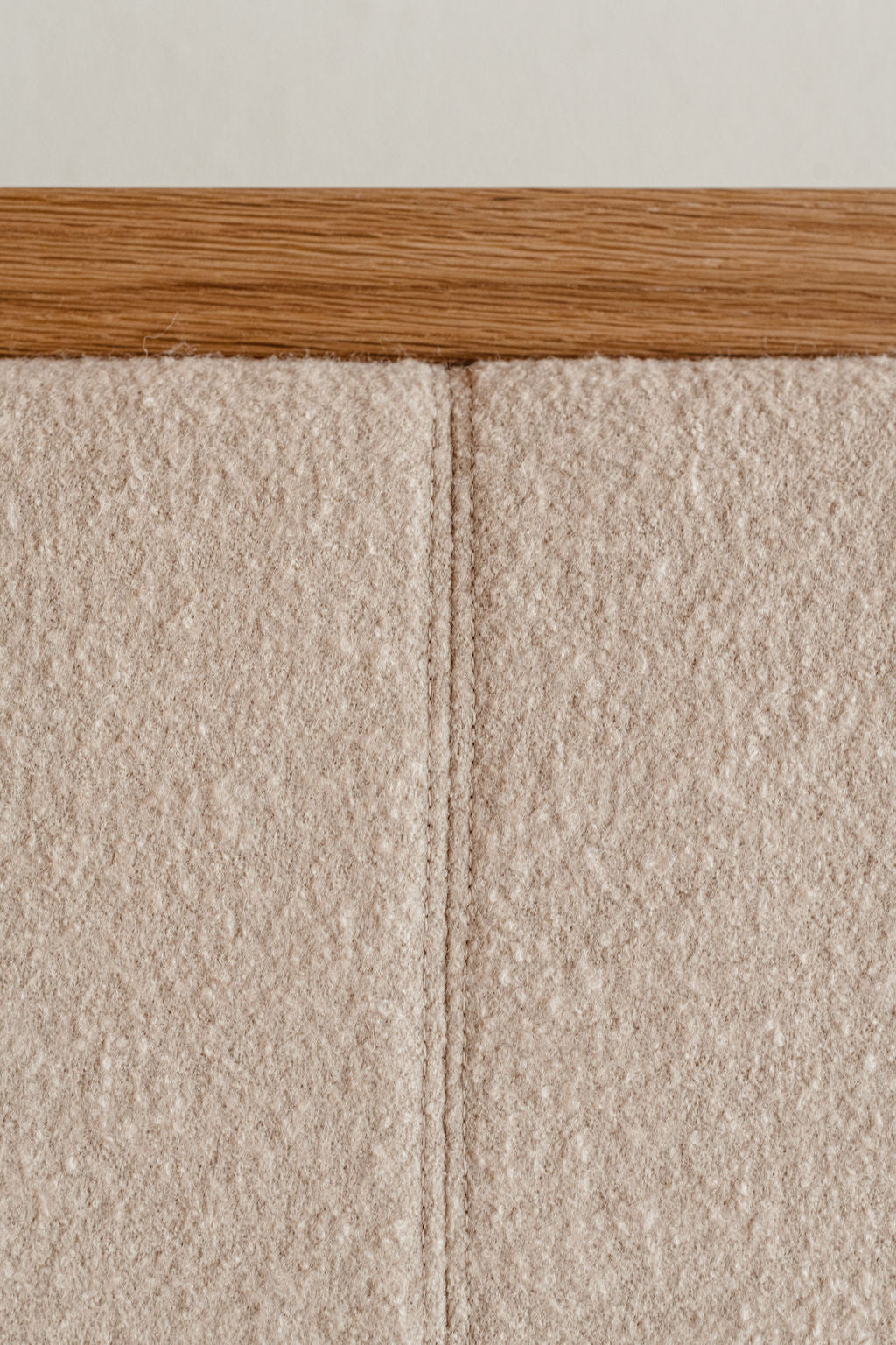 Details of stitching on upholstered headboard of Dune Upholstered Bed