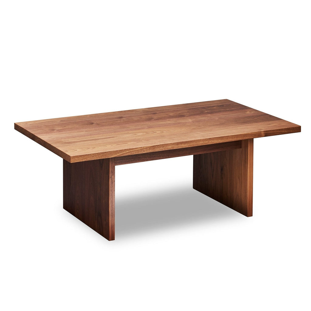 Modern handcrafted wood coffee table with trestle panel style legs in solid walnut