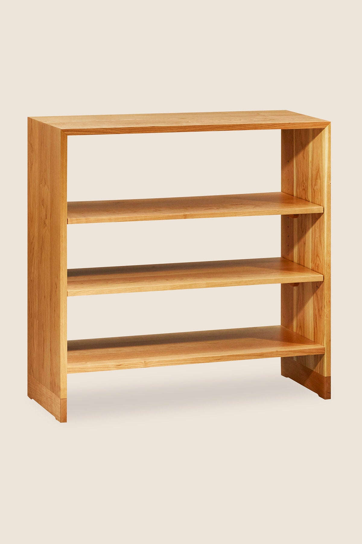 Backless Lubec Short Shelf in cherry with breadboard leg base