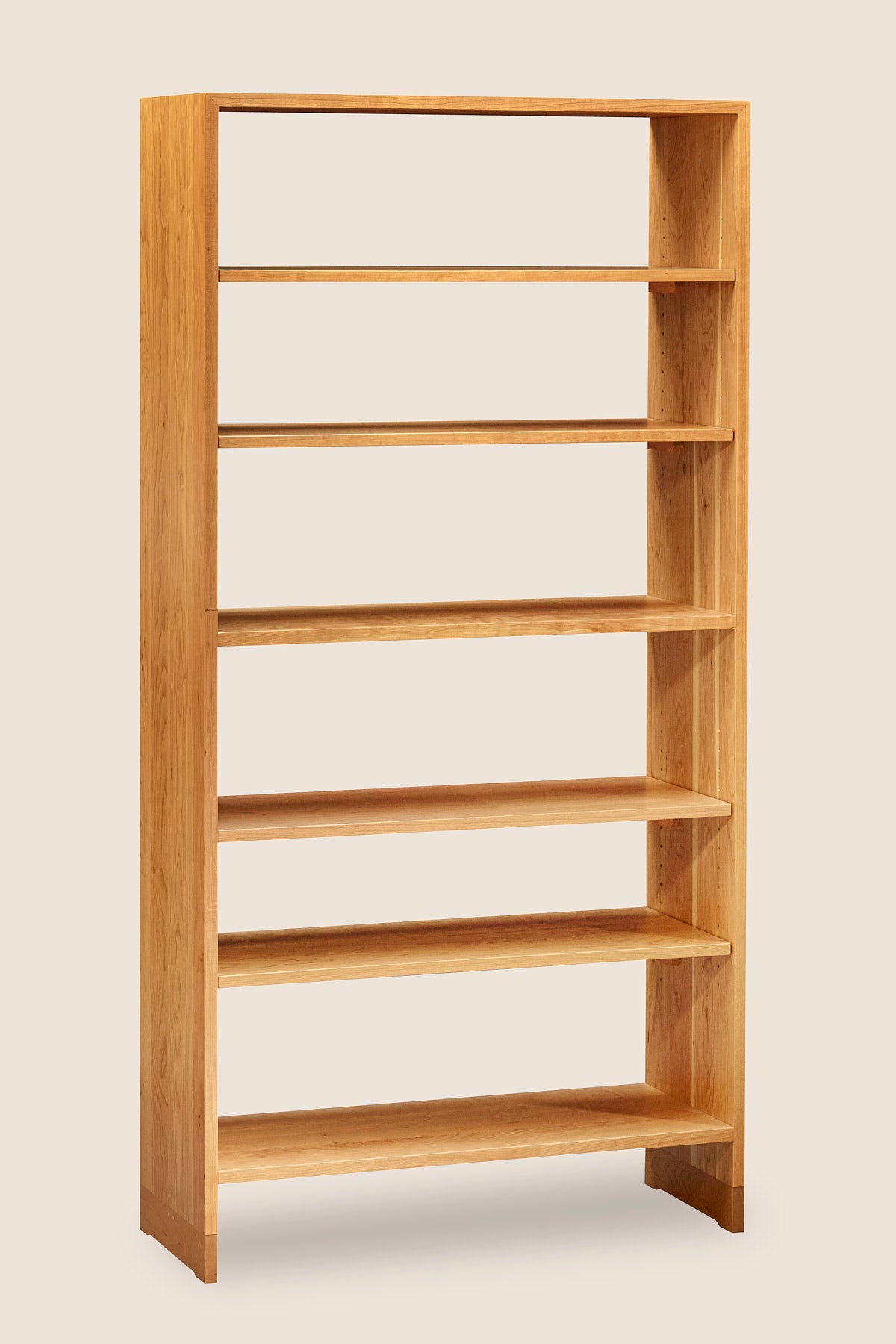 Backless Lubec Tall Shelf in cherry with breadboard leg base