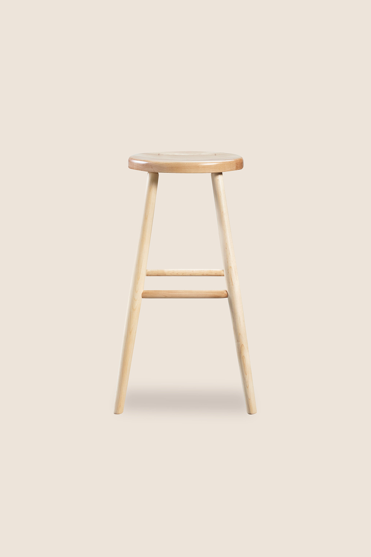 Simple round solid maple wood stool, from Arkansas's Mazhil & Co. Co.