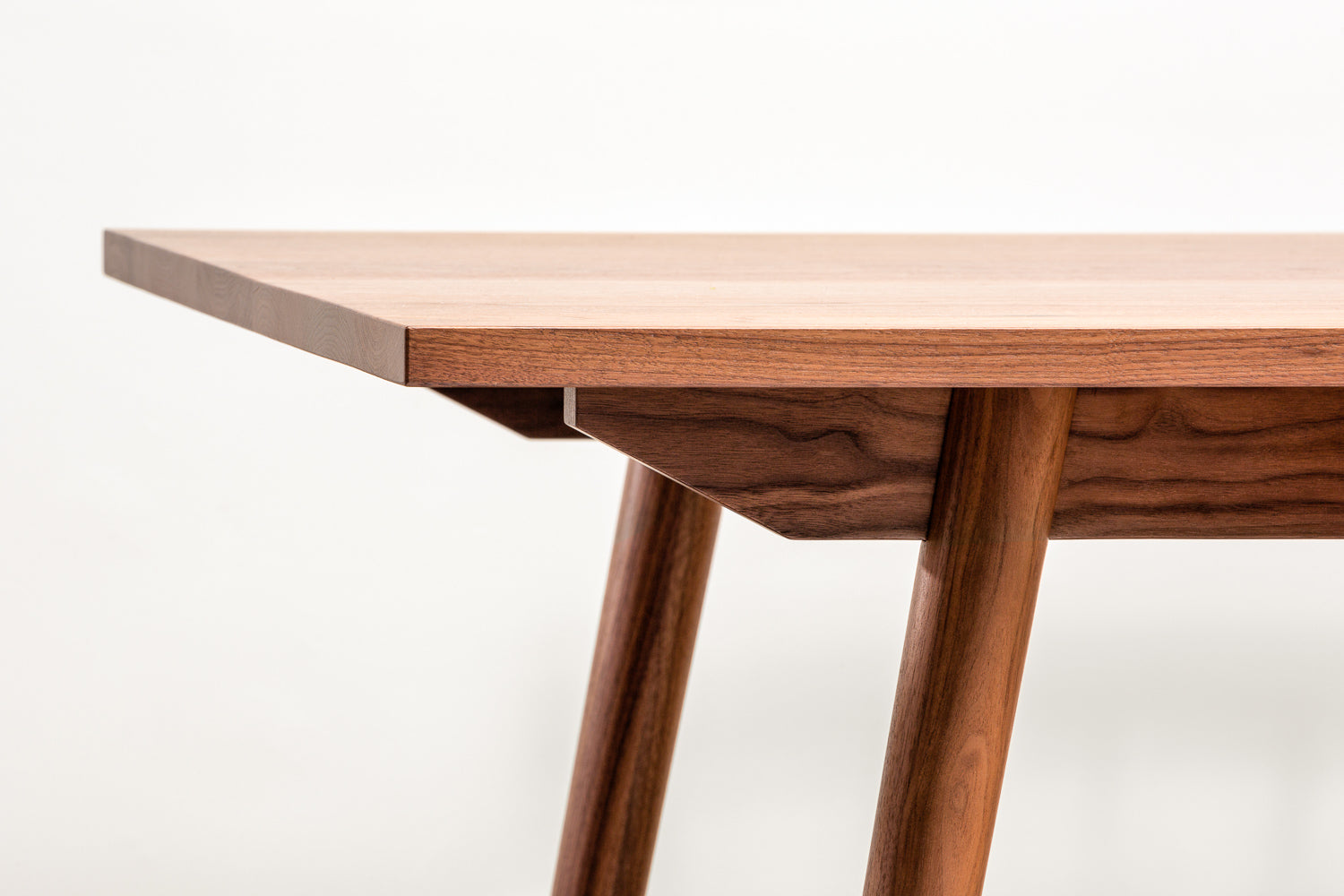 Scandinavian inspired walnut dining table from Chilton Furniture.