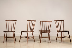 Four walnut Concord chairs shown in every angle