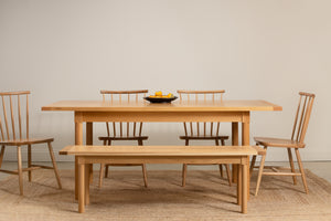 Revelry dining set from Chilton Furniture shown in white oak solid wood with fruit on table