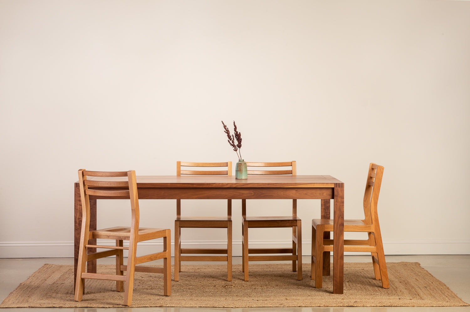 Chilton Furniture's solid walnut wood Harbor Dining Table with Dockside chairs