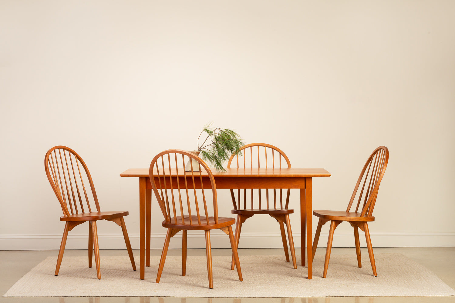 Chilton Furniture's Bass Harbor Dining Table paired with four Farmington Chairs in cherry wood