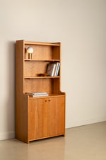 Chilton Furniture's Avery Shelf, styled with books and a portable lamp