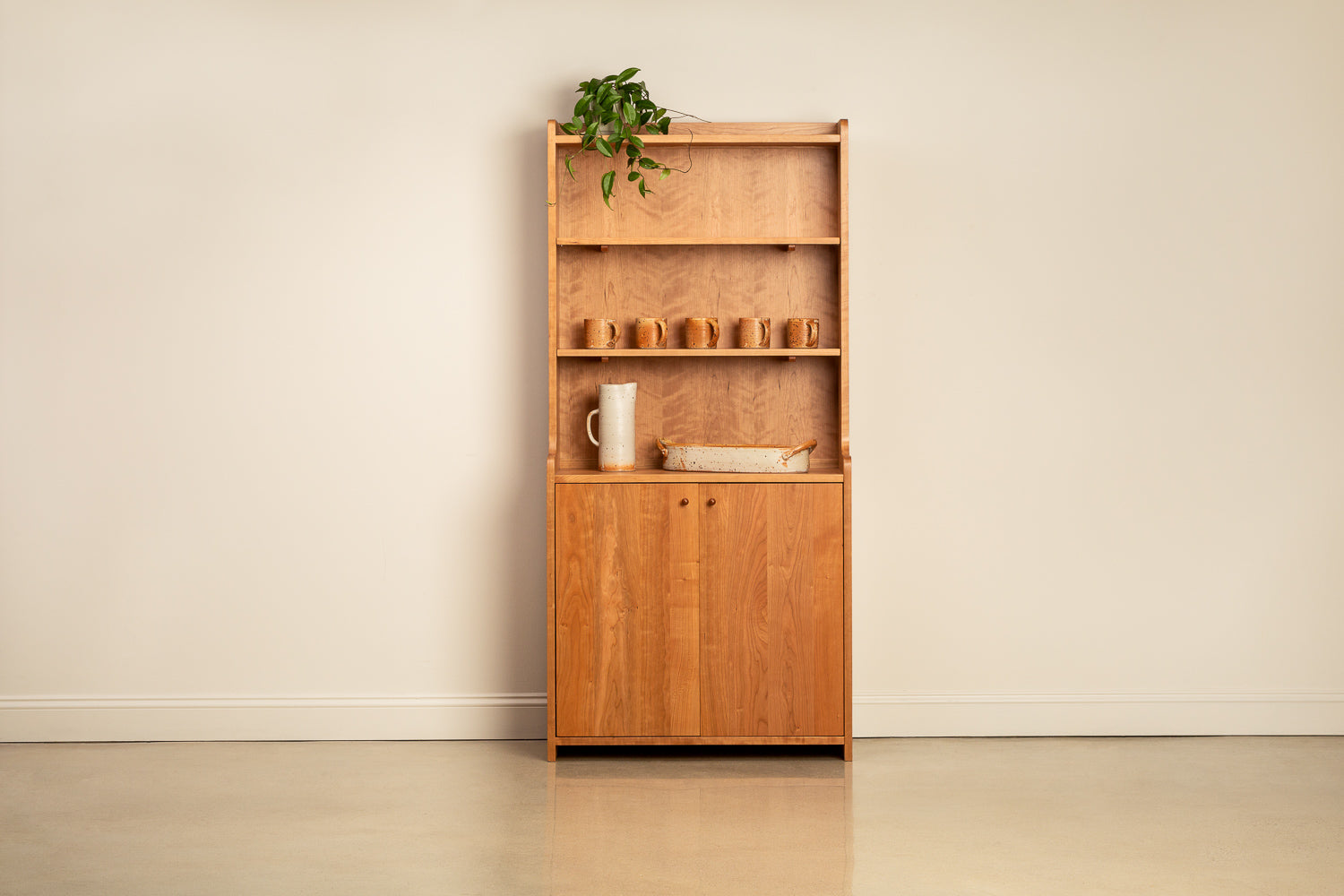 Chilton Furniture's Avery Shelf, styled as a dining room hutch with Buckland Ceramics 