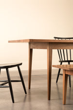 Side view of Shaker Heirloom Table and Bench in walnut wood