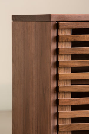 Details of slats and edging on modern walnut Upland Media Stand from Chilton Furniture of Maine