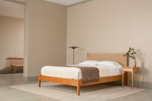 Neutral minimalist bedroom with Shaker Heirloom Side Table, MS3 Bed, lamp  and flowers in vase