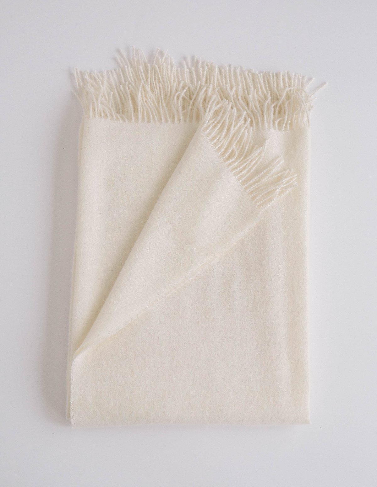 Soft white alpaca throw blanket
