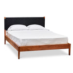 Shaker style bed in walnut wood with woven Shaker tape headboard