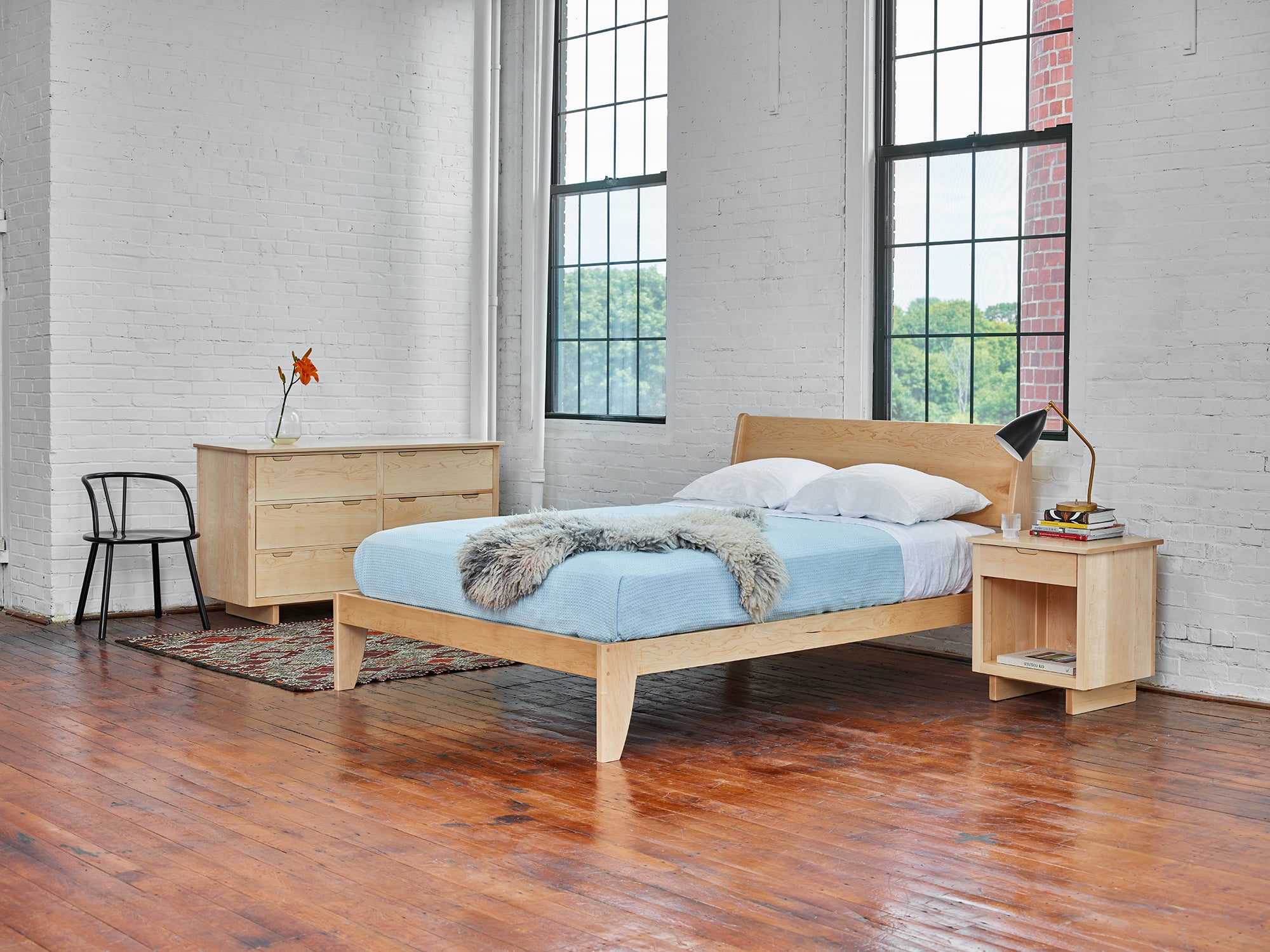 Modern bedroom with hard maple wood Foundation Line and Mysa bed, from Maine's Chilton Furniture Co.