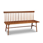 Traditional Shaker style spindle bench with back and angular lines in walnut