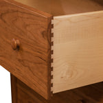 Open drawer of solid cherry Bethel Dresser showing dovetail joinery