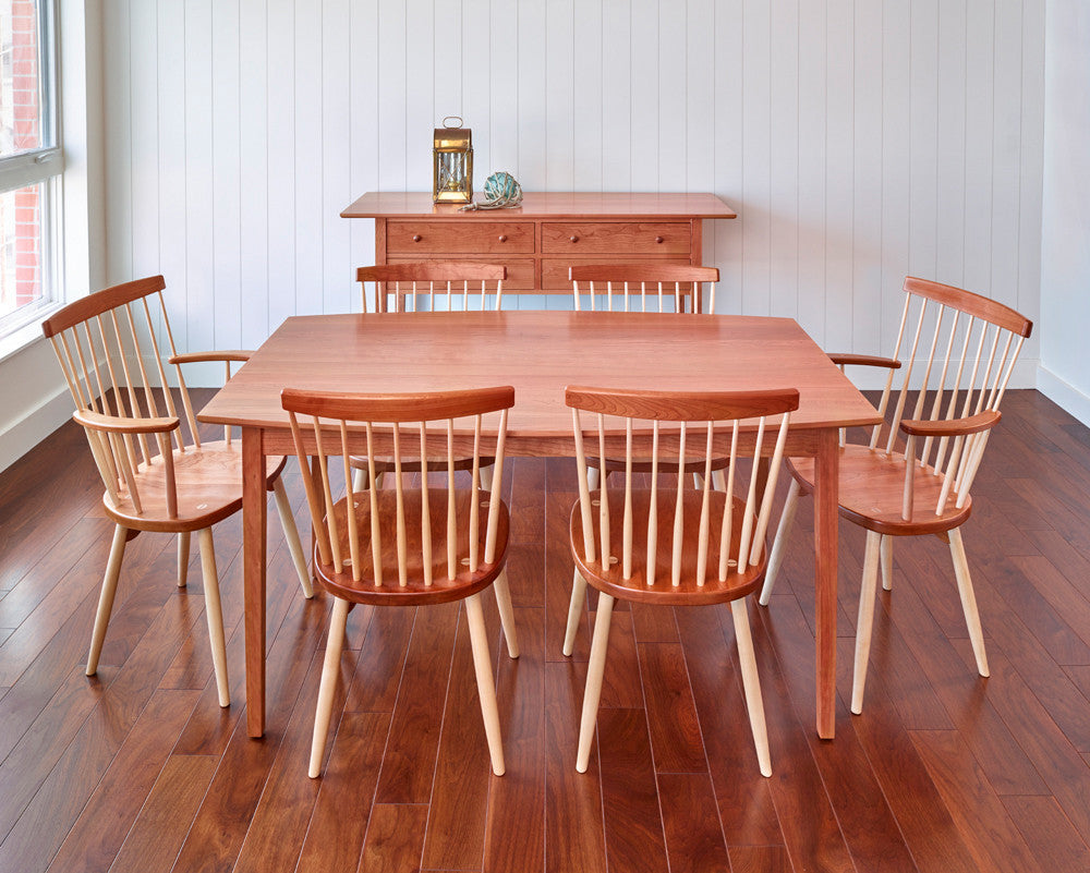 Clean dining room with Shaker sideboard, Bass Harbor Table and six Windsor style chairs, all made of cherry wood
