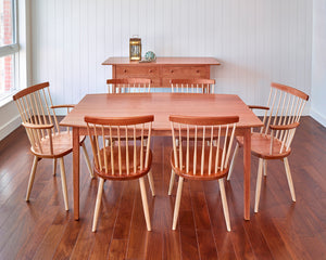 Clean dining room with Shaker sideboard, Bass Harbor Table and six Windsor style chairs, all made of cherry wood