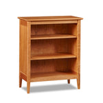 Three foot Shaker style bookcase with tapered legs in cherry