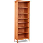 Seven foot Shaker style bookcase with tapered legs in cherry