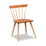 Modern Windsor inspired spindle chair with curved back in cherry and ash