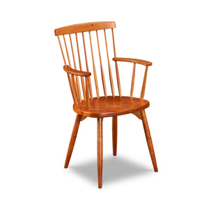 Classic spindle back chair arm chair with round tapered legs in solid cherry wood