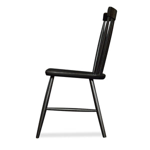 Side view of spindle style dining chair in red oak wood painted black from Chilton Furniture