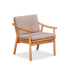 Solid cherry Scandinavian style lounge chair with Knoll fabric cushions in Putty, from Maine's Chilton Furniture Co.
