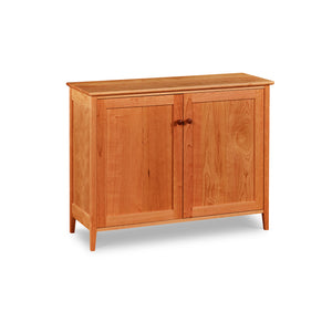 Shaker style cupboard with two doors built of cherry wood from Maine's Chilton Furniture Co.