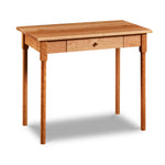 Small shaker inspired writing desk with one drawer and round legs in cherry wood