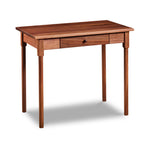 Small shaker inspired writing desk with one drawer and round legs in walnut wood