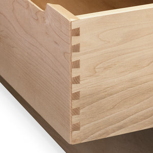 Open drawer of maple Foundation Chest showing dovetail joinery