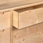 Open drawer of of maple Foundation Dresser