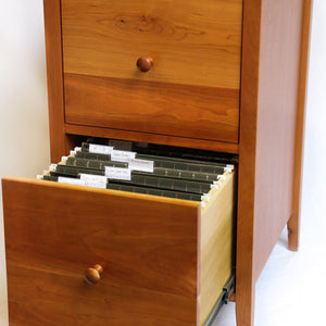 Open drawer of Shaker file office storage with green files inside